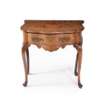 A Dutch burr walnut and marquetry serpentine side table