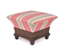 A George IV carved oak and upholstered ottoman footstool