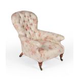 An George IV birch and upholstered armchair