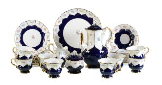 A Meissen blue-ground and gilt 'B-Form' part coffee service painted with panels of flowers