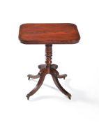 ϒ A Regency mahogany and rosewood crossbanded pedestal table