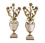 A pair of Continental white marble and gilt bronze mounted three light candelabra