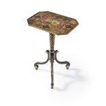 A Regency ebonised and parcel gilt tripod table