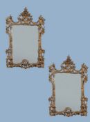 A pair of Continental gilt composition wall mirrors