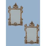 A pair of Continental gilt composition wall mirrors