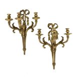 A pair of substantial gilt bronze three light wall appliques in Louis XVI taste