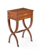 A Charles X amboyna, satinwood and specimen wood and parquetry work table