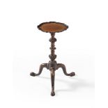 A George III mahogany 'pie crust' candle stand