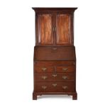 A George II mahogany bureau bookcase