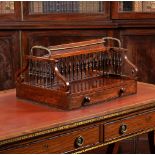 ϒ A Regency rosewood and gilt metal mounted book porter