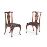 A set of twelve mahogany dining chairs