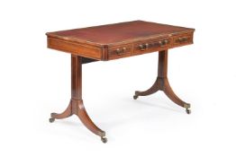 A Regency 'fiddle back' mahogany writing table