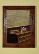 A William & Mary olivewood and walnut oyster veneered wall mirror