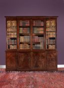 A George III mahogany breakfront library bookcase