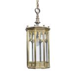 A Victorian gilt bronze and glazed hanging lantern in Gothic revival taste