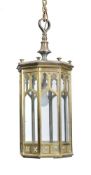 A Victorian gilt bronze and glazed hanging lantern in Gothic revival taste