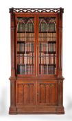 A George IV mahogany and plum pudding mahogany cabinet bookcase