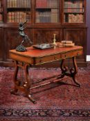 A Regency mahogany and partridge wood library table