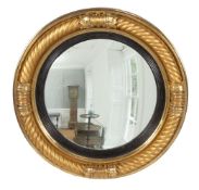 A George III giltwood convex mirror