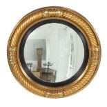 A George III giltwood convex mirror