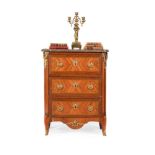 ϒ A Louis XV/ XVI transitional tulipwood and sycamore banded petit commode