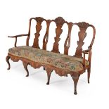 A Danish carved beech and needlework upholstered chair back settee