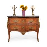 ϒ A Louis XV tulipwood and palisander serpentine commode