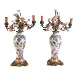 A pair of French famille rose gilt-metal-mounted four-light baluster flower-encusted lamps of Edme S