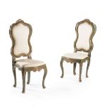 A set of eight Italian parcel gilt and green painted chairs