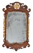 A George II walnut and parcel gilt wall mirror