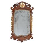 A George II walnut and parcel gilt wall mirror