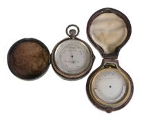 A silver aneroid pocket barometer