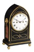 A Regency brass mounted ebonised small lancet bracket clock with trip hour repeat