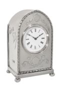 An Edwardian silver cased small lancet-shaped desk timepiece