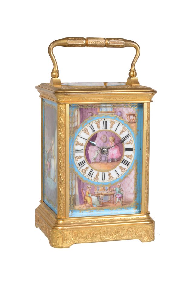A fine French painted porcelain panel inset engraved gilt brass carriage clock with push-button repe