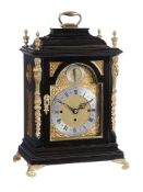 A Victorian gilt brass mounted ebonised quarter chiming bracket clock in the George III style