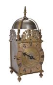 A Charles II brass lantern clock