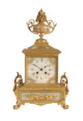 A French gilt brass and onyx mantel clock in the Louis XVI taste