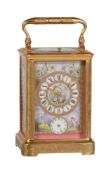 A fine French engraved gilt brass and porcelain panel inset carriage clock with push-button repeat a