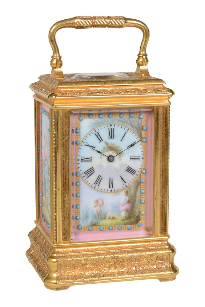 A fine French painted porcelain panel inset engraved gilt brass miniature carriage timepiece
