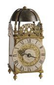 An English brass lantern clock Bearing a signature for Thomas Knifton