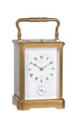A French lacquered brass carriage clock with push-button repeat and alarm made for the Middle-Easter