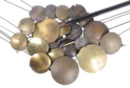 A group of fifteen brass-faced longcase clock pendulum bobs