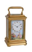 A fine French gilt brass miniature carriage timepiece with painted porcelain dial