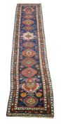 A Karaja Runner, North West Persian, late 19th century , 494cm long, 103cm wide
