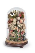 A Victorian woolwork flower arrangement, last quarter 19th century, the simulated bouquet comprising