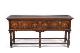 A William & Mary oak dresser base, circa 1690, with three frieze drawers each with moulded drawer