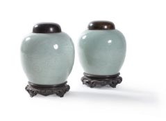 A pair of Chinese celadon ‘Dragon’ ginger jars, Qing Dynasty, late 18th or 19th century, carved