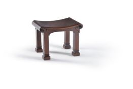 A George II style mahogany stool, 20th century, the moulded solid concave seat with scroll carved