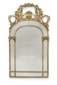 A continental giltwood mirror, 18th century, the cresting in the form of opposed sphinxes issuing